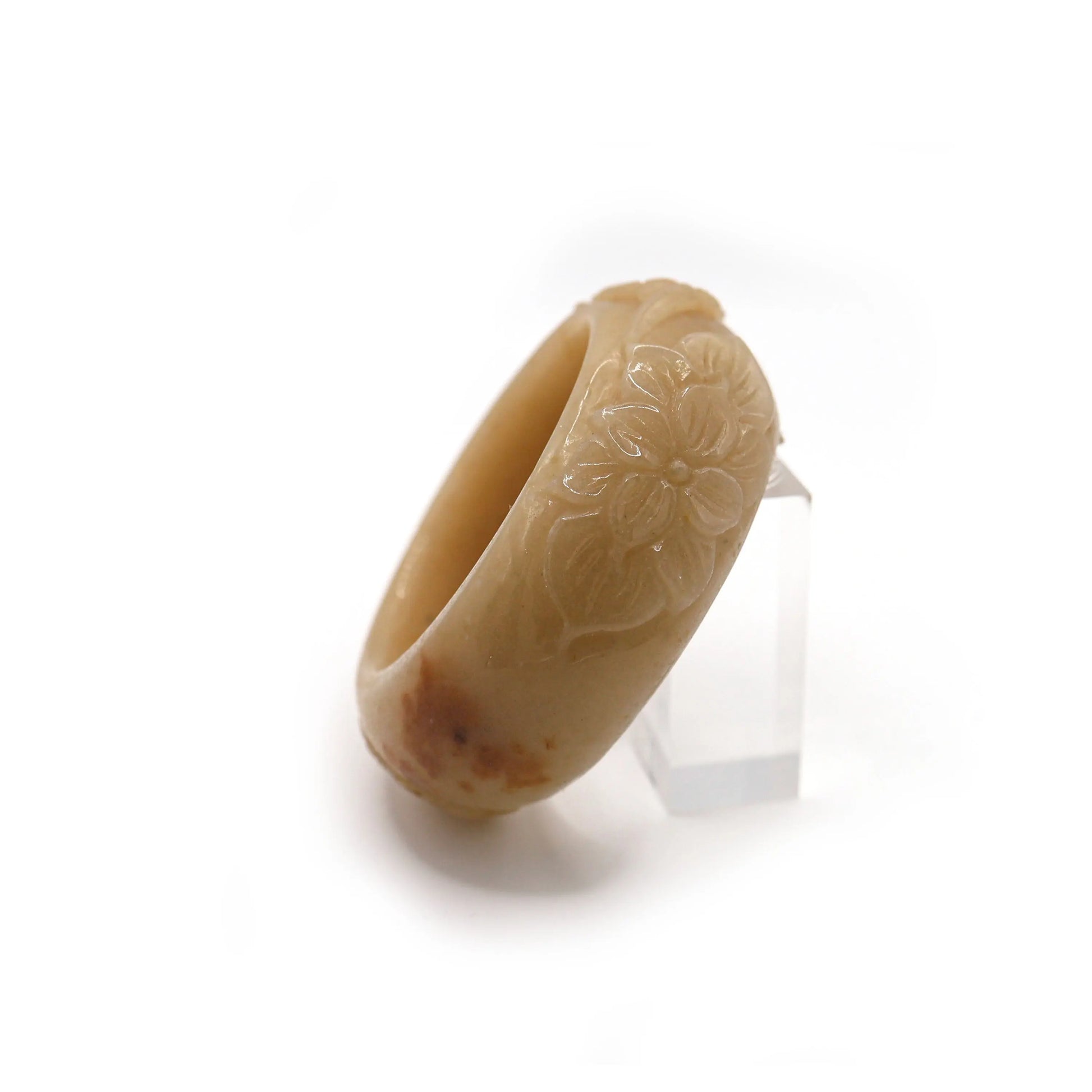 Yellow quartzite jade bracelet with elegant full-circle shape and intricate high-relief floral carvings along its surface – Miruzi