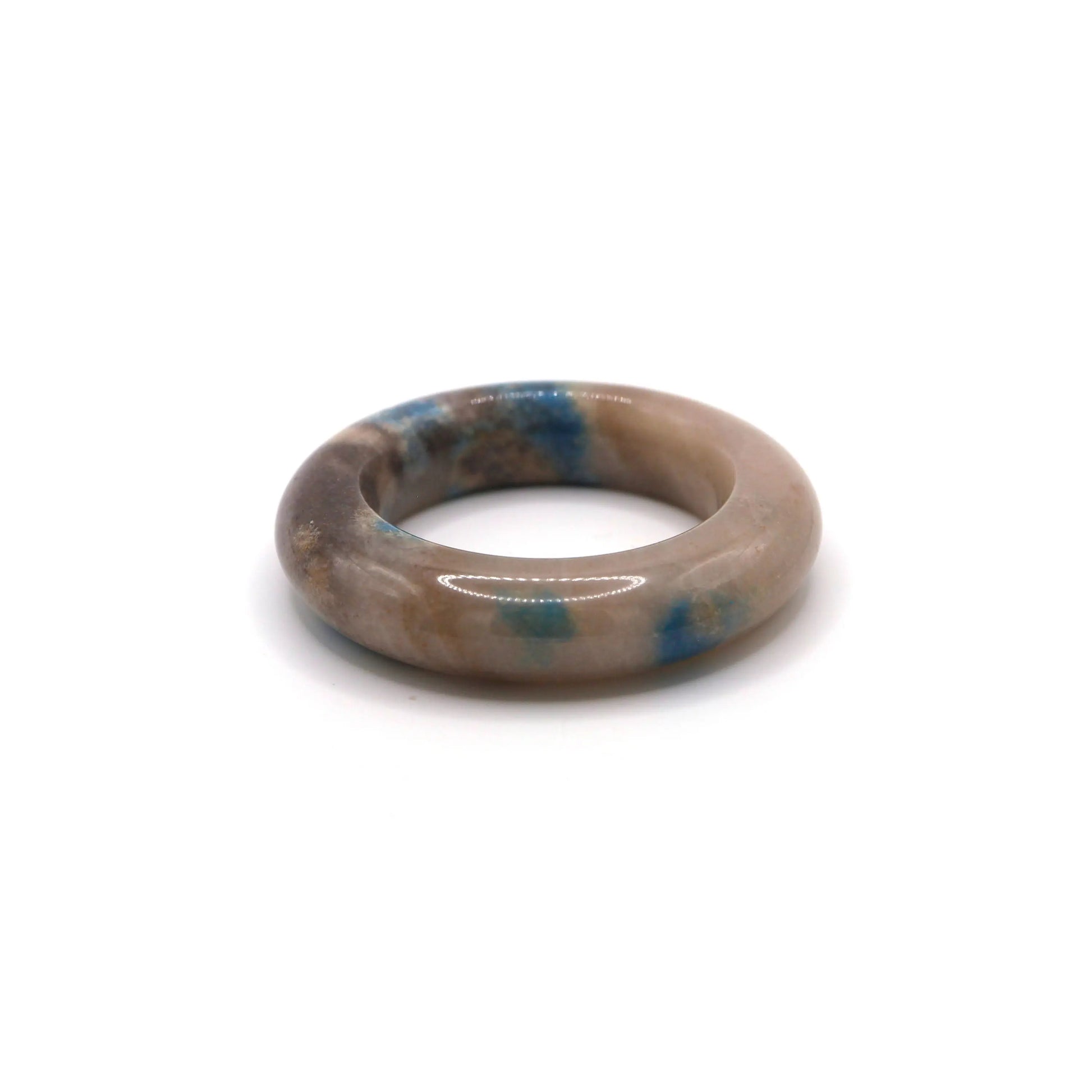 Rounded quartzite jade bracelet carved in donut form, with watercolor-like mineral patches in soft blue and light purple – Miruzi