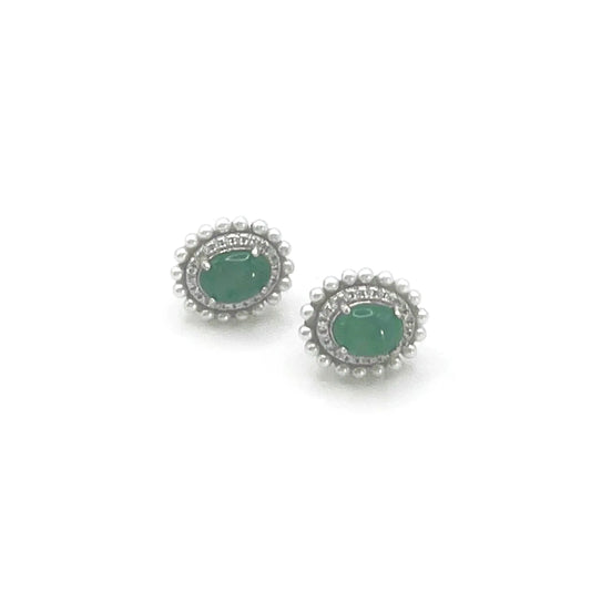 Jadeite stud earrings featuring deep green jadeite gemstones encircled by pearlescent accents, showcasing classic elegance and refined craftsmanship.