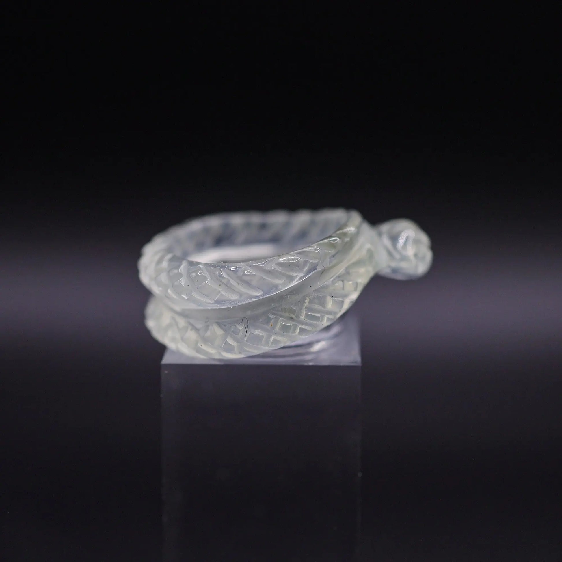 Handcrafted Ethereal Serpent Ring featuring an icy white serpentine base with a delicately carved snake wrapping around the finger, symbolizing wisdom and rebirth. The exquisite detailing and three-dimensional snake design make this ring a unique piece of enchanting, mythical-inspired jewelry, perfect for adding a touch of mystical elegance to any outfit.