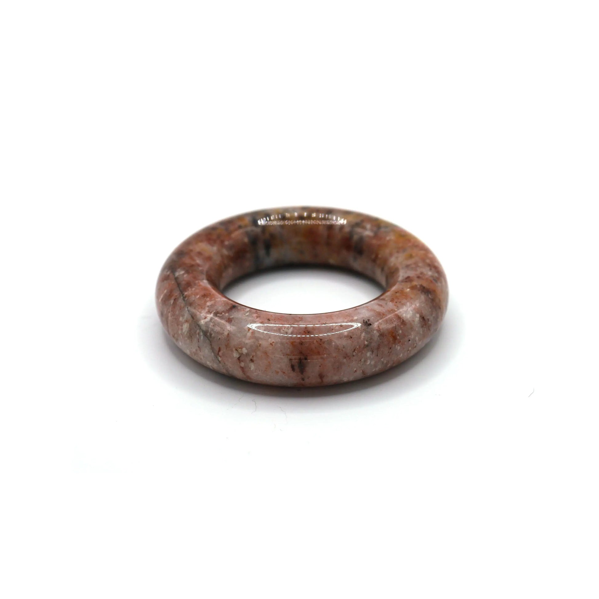 Light pink jade bangle with fluid multicolor veins and specks, creating a textured, painterly effect in polished stone – Miruzi