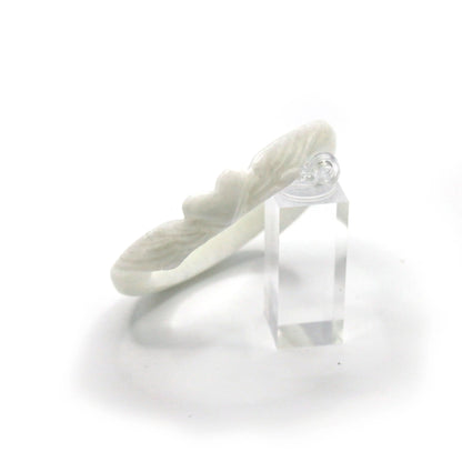 Jade bangle in a milky white tone with hand-carved feather shapes and a center heart, offering elegance with gentle meaning – Miruzi
