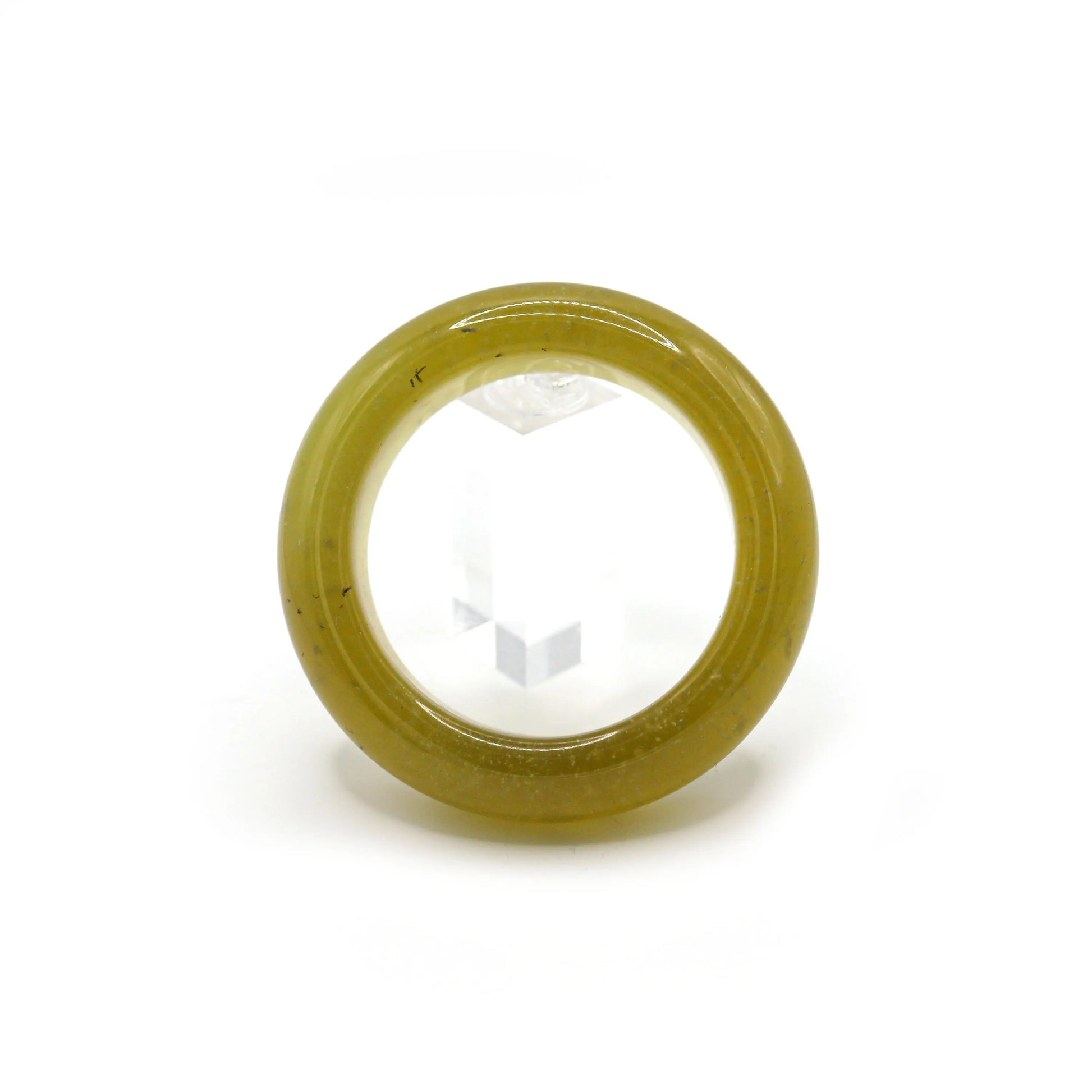 Radiant yellow jade bracelet featuring suspended micro-bubbles and high polish for a summery, luminous look. Miruzi