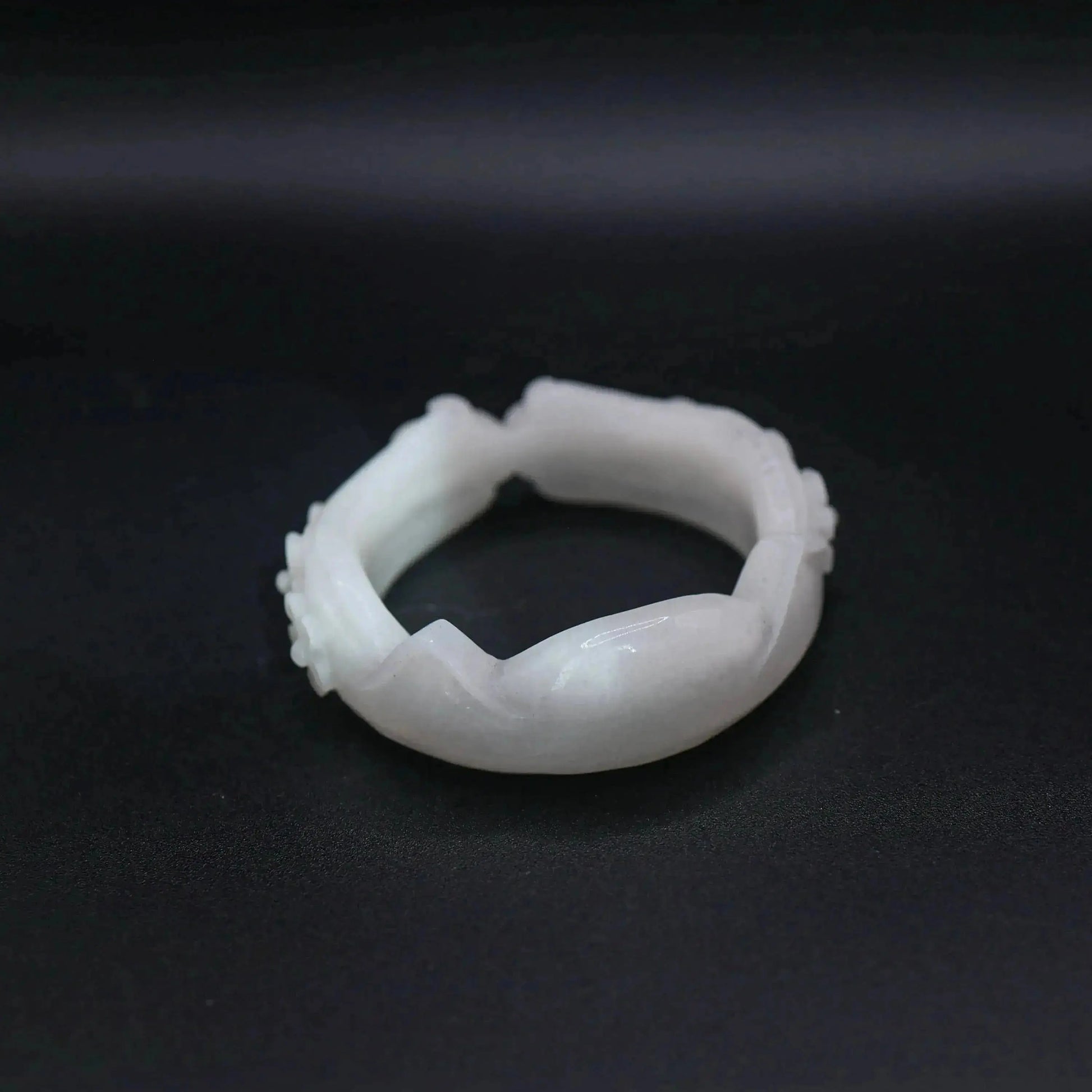 Artisan-crafted white jade bangle with sculpted feline ears, tiny paw prints, and symbolic floral motifs for animal lovers – Miruzi