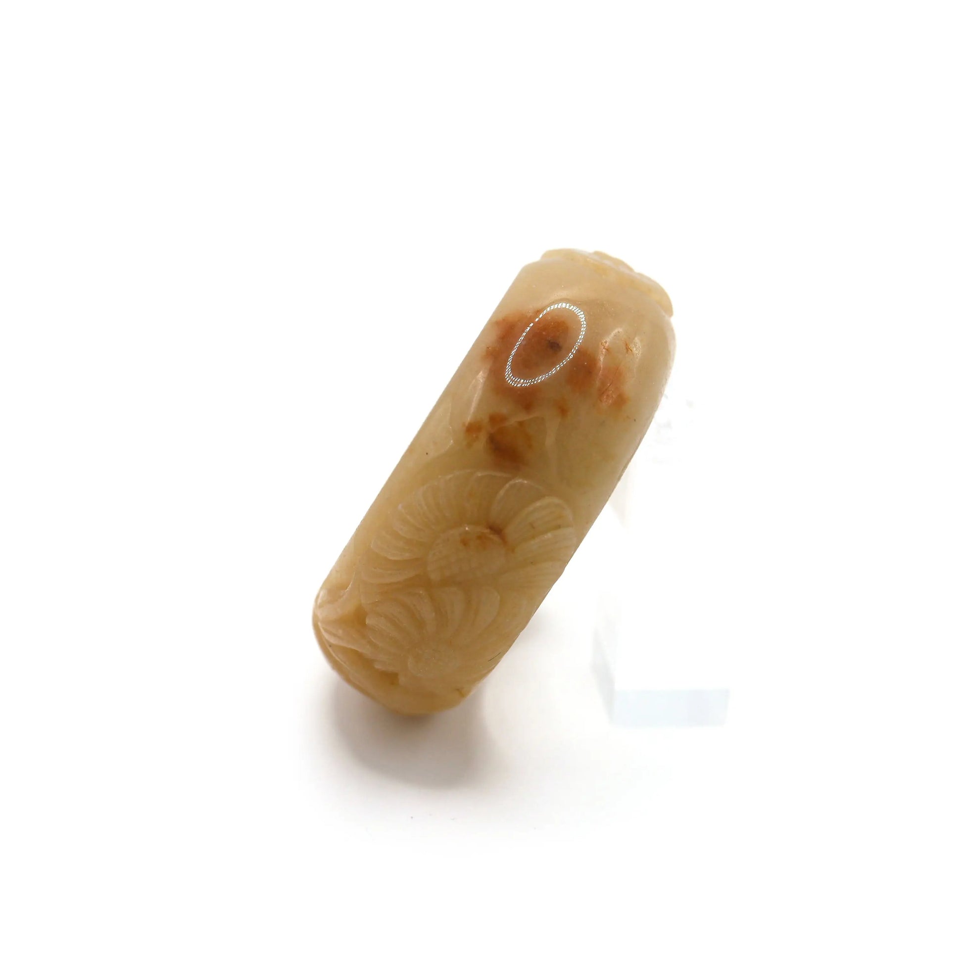 A smooth and softly glowing yellow jade bangle etched with four symbolic flowers, embodying traditional Chinese virtues – Miruzi
