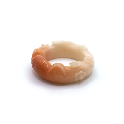 Feline-inspired Mongolian jade bracelet with soft polish, floral carving, and a gentle mark between ear and flower, offered at 20% off – Miruzi

