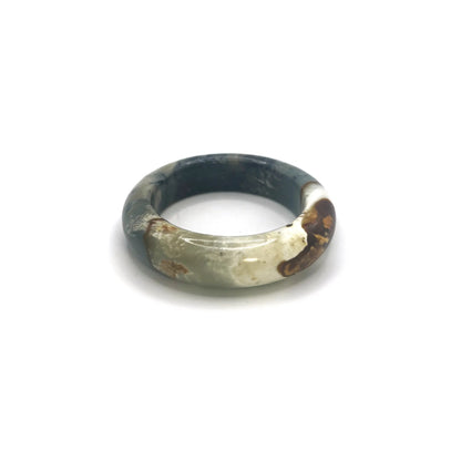 Ocean bracelet for women made from serpentine stone, featuring deep blue, black, and white hues inspired by ocean waves and natural coastal textures. - Miruzi