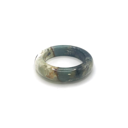 Ocean bracelet for women made from serpentine stone, featuring deep blue, black, and white hues inspired by ocean waves and natural coastal textures. - Miruzi