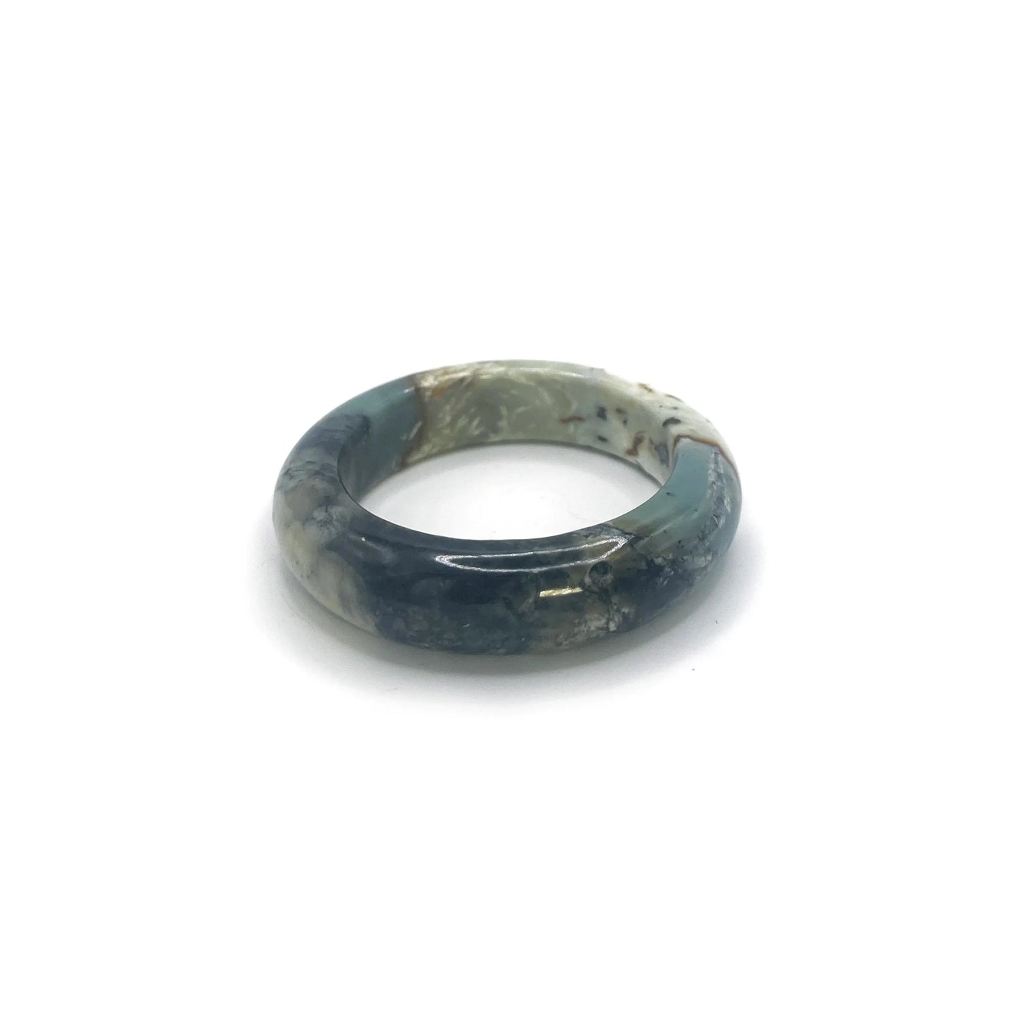 Ocean bracelet for women made from serpentine stone, featuring deep blue, black, and white hues inspired by ocean waves and natural coastal textures. - Miruzi