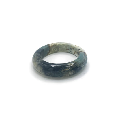 Ocean bracelet for women made from serpentine stone, featuring deep blue, black, and white hues inspired by ocean waves and natural coastal textures. - Miruzi