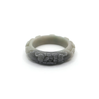 Hand-carved pale green jade bracelet featuring a soft black peony bloom and floating cloud motifs in raised relief for subtle elegance – Miruzi