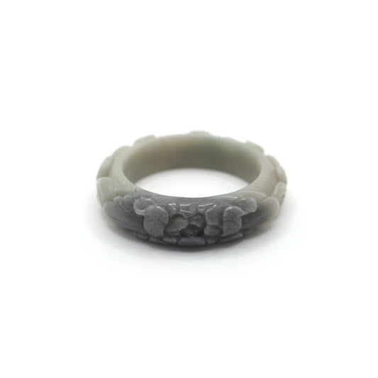Hand-carved pale green jade bracelet featuring a soft black peony bloom and floating cloud motifs in raised relief for subtle elegance – Miruzi