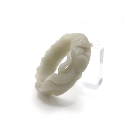 Full-circle jade bracelet with a sleeping fox and regal peony carved in high relief, balancing protection and elegance – Miruzi