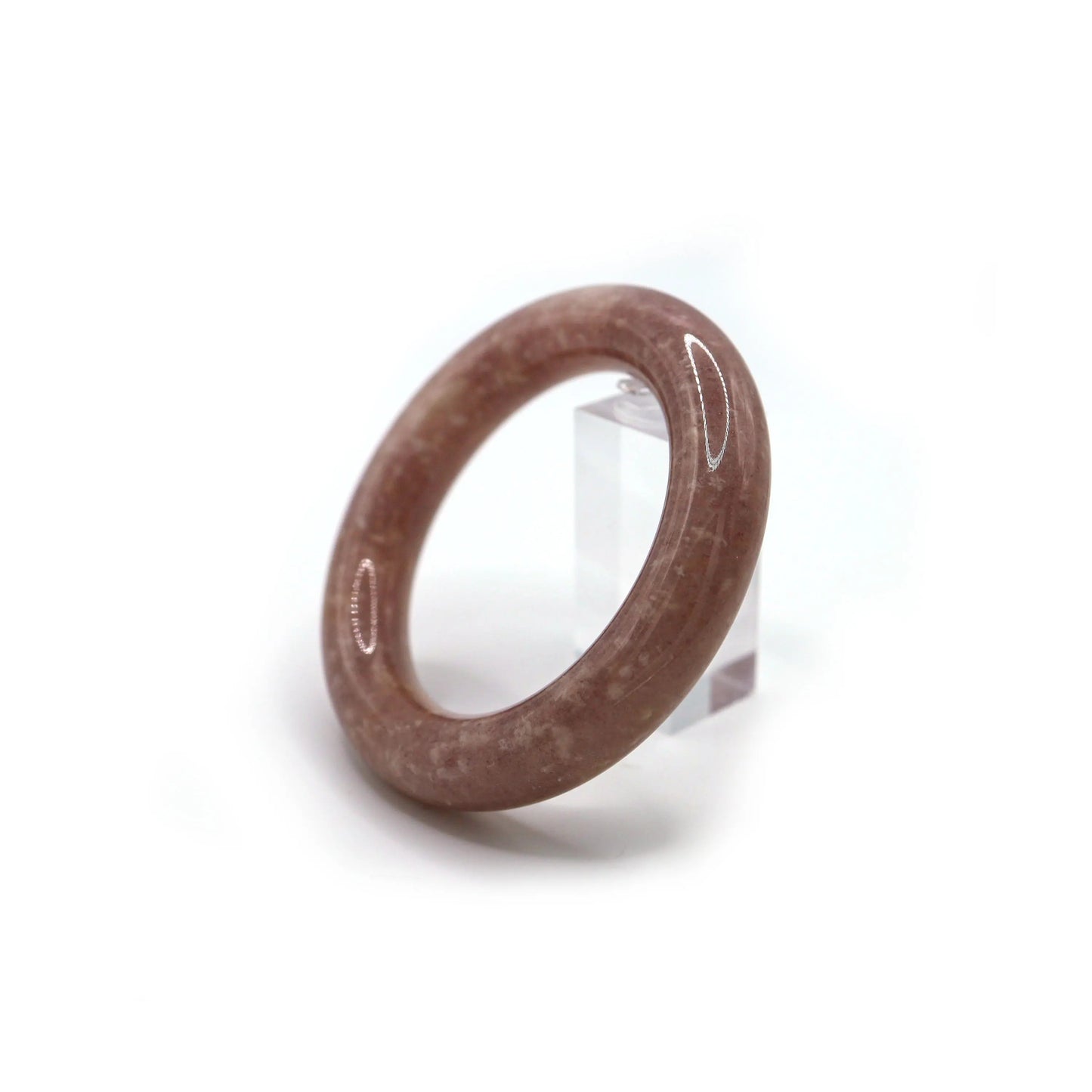 Hand-carved jade bangle in dreamy orchid purple, featuring soft white specks that create a celestial shimmer on the wrist – Miruzi