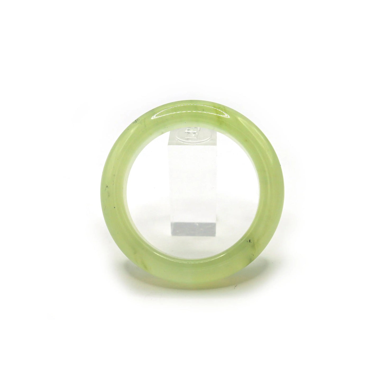 Translucent pale green jade bangle displayed on a clean white background, emphasizing its weightless and pure design – Miruzi