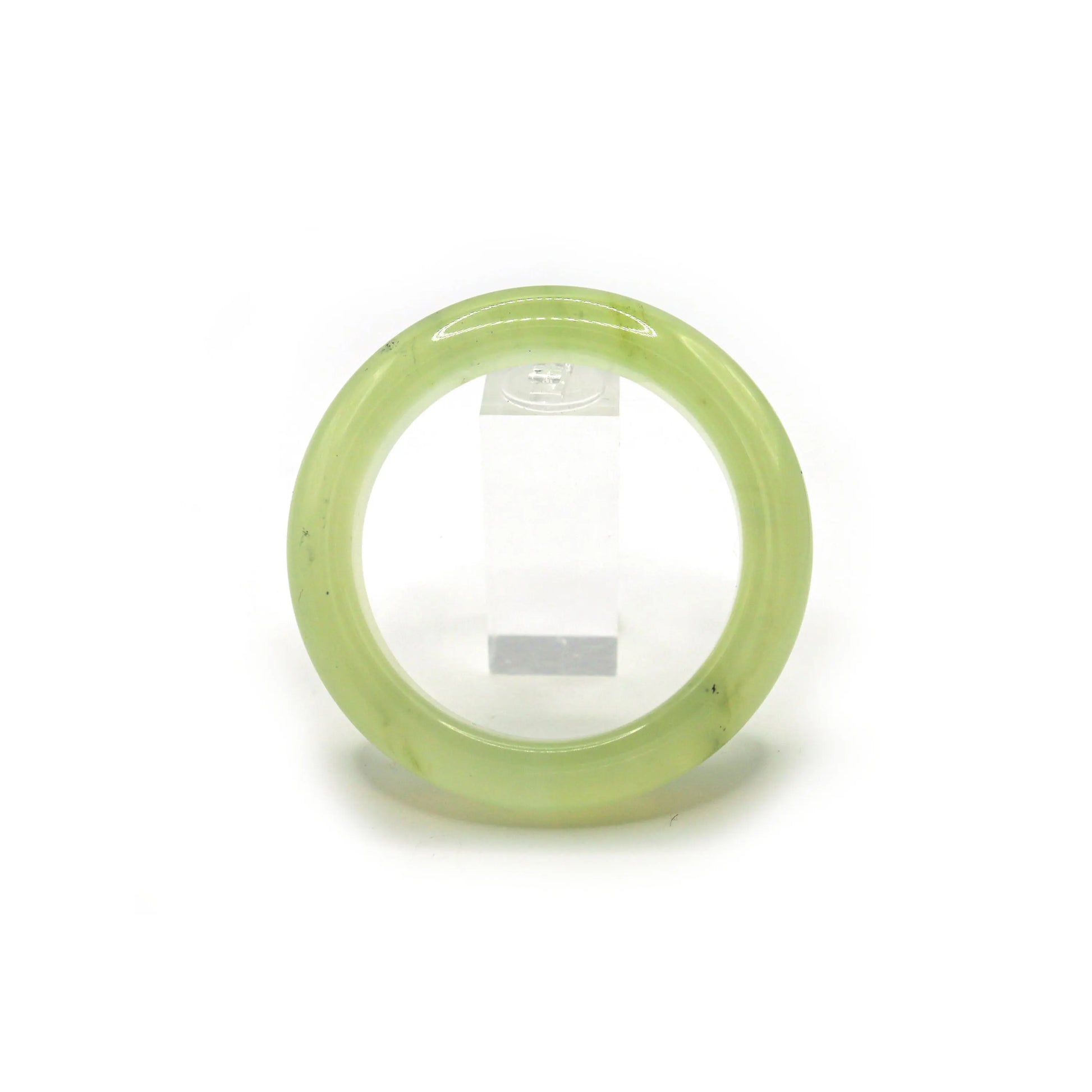 Translucent pale green jade bangle displayed on a clean white background, emphasizing its weightless and pure design – Miruzi