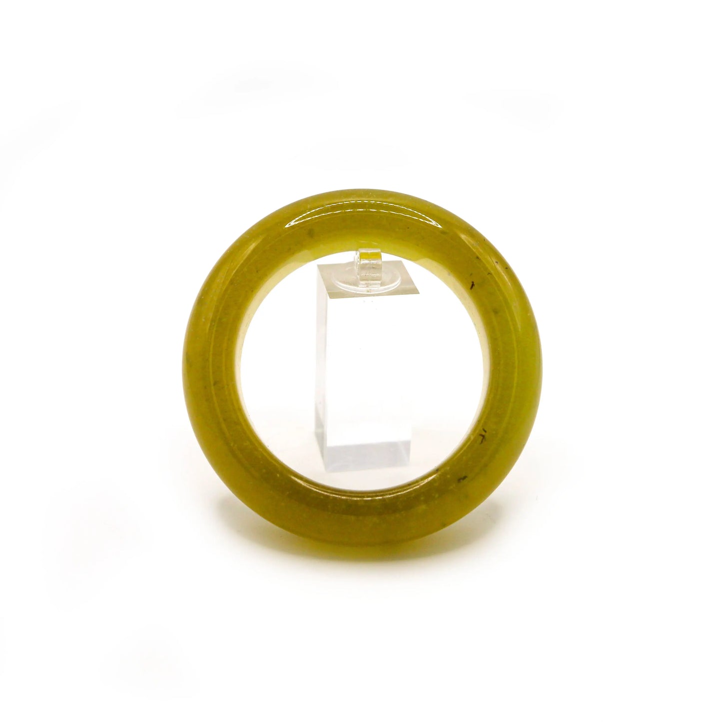 Lightweight yellow jade bangle glowing with amber hues and shimmering micro-bubbles, displayed on neutral background.
 Miruzi
