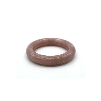 Polished Mongolian jade bangle in a pink-toned purple, lightly flecked with irregular white inclusions like drifting stardust – Miruzi
