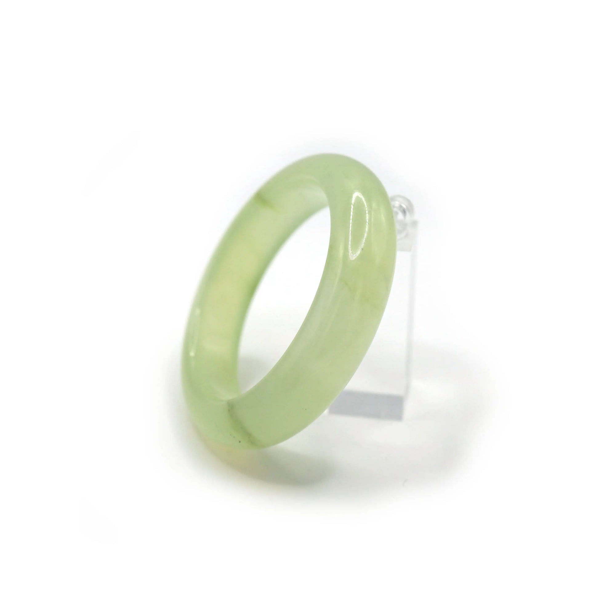 Delicate translucent jade bracelet with a soft mint tint and flawless clarity, styled beside cool-toned silk for a serene vibe – Miruzi