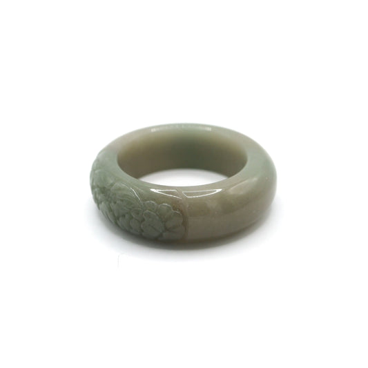 Hand-carved jade bangle featuring a delicately sculpted peony blossom on one side of the smooth green stone for subtle floral beauty – Miruzi
