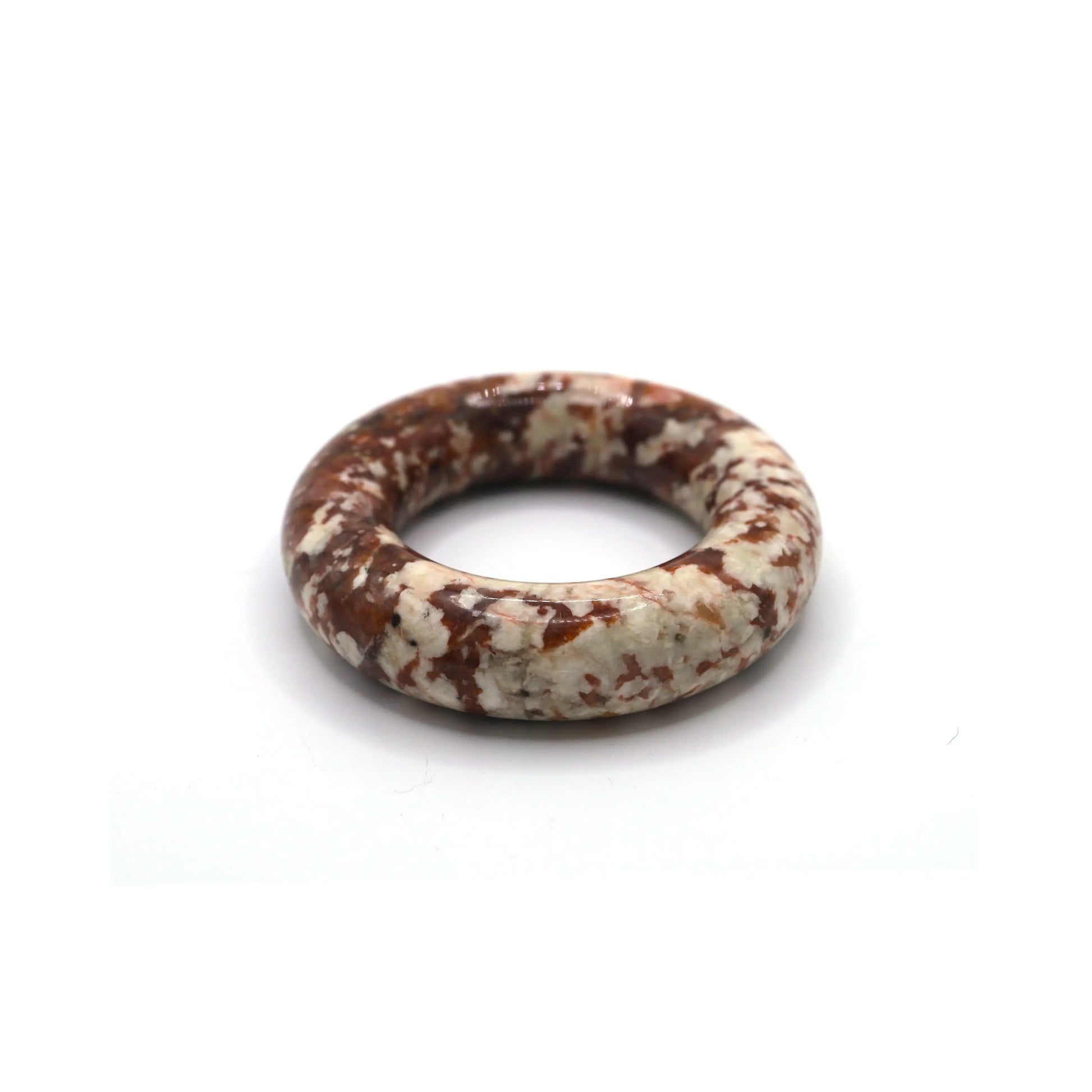 Polished round red jade bangle with a dense spread of natural white dots, styled to reflect cultural warmth and charm – Miruzi