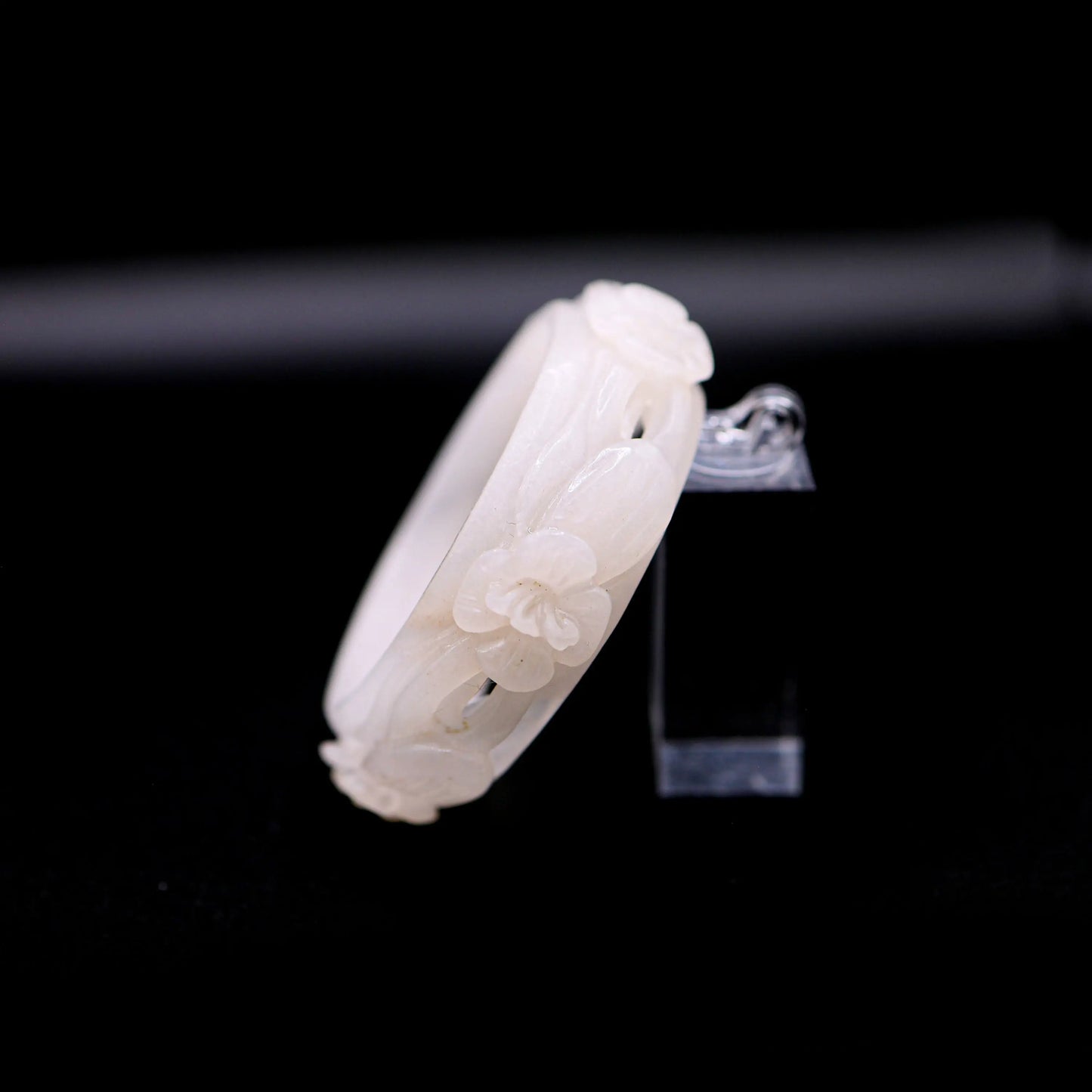 Sculptural Mongolian jade bracelet with open violet flowers, combining soft opacity with artistic floral craftsmanship – Miruzi