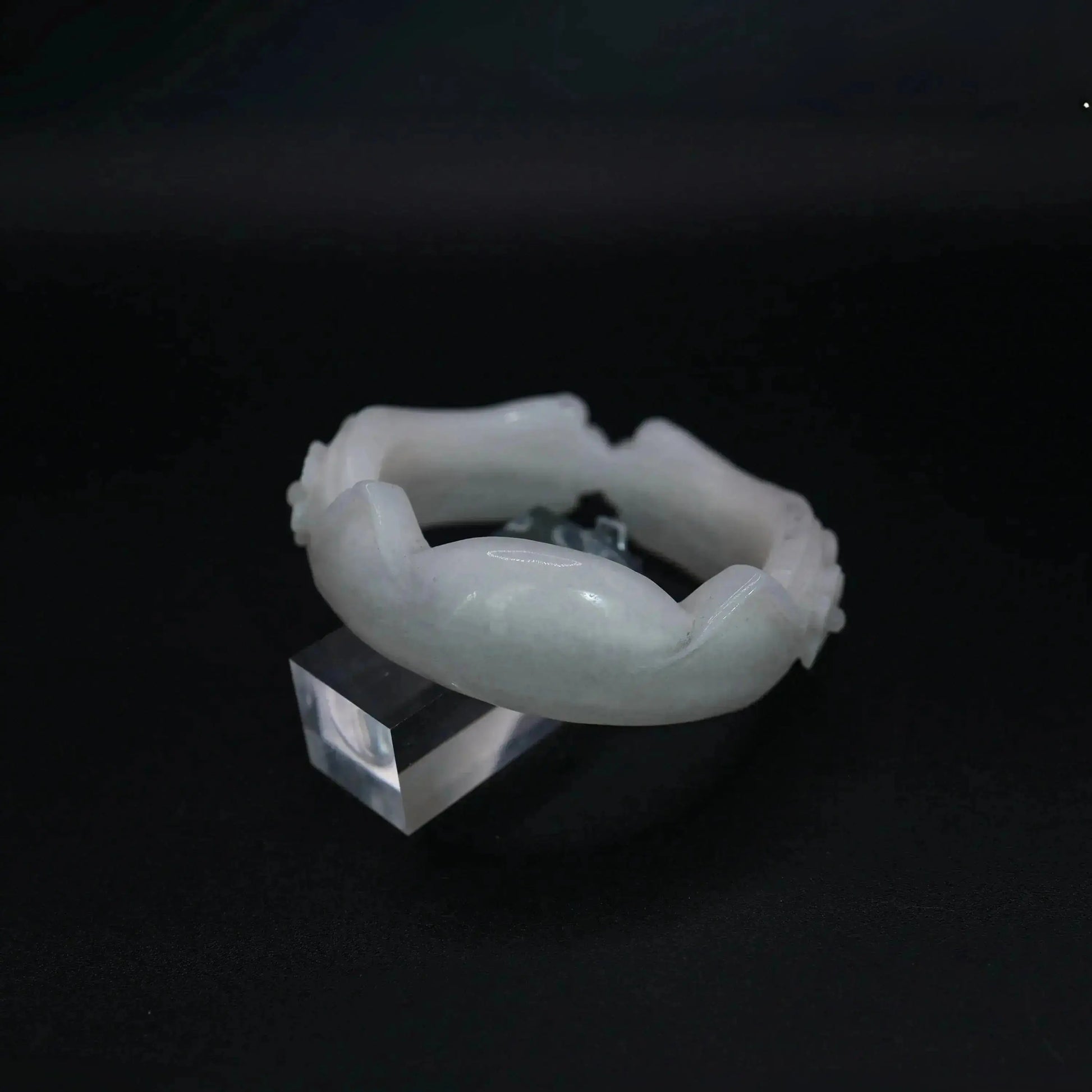 Petite jade bangle carved from natural white Mongolian stone with feline ear shapes and floral touches, perfect for soft styling – Miruzi