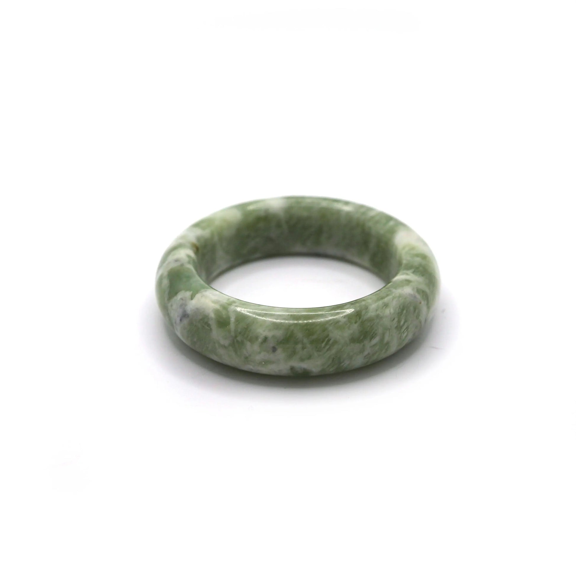 Woman wearing matcha green jade bracelet with pistachio-toned outfit - Miruzi