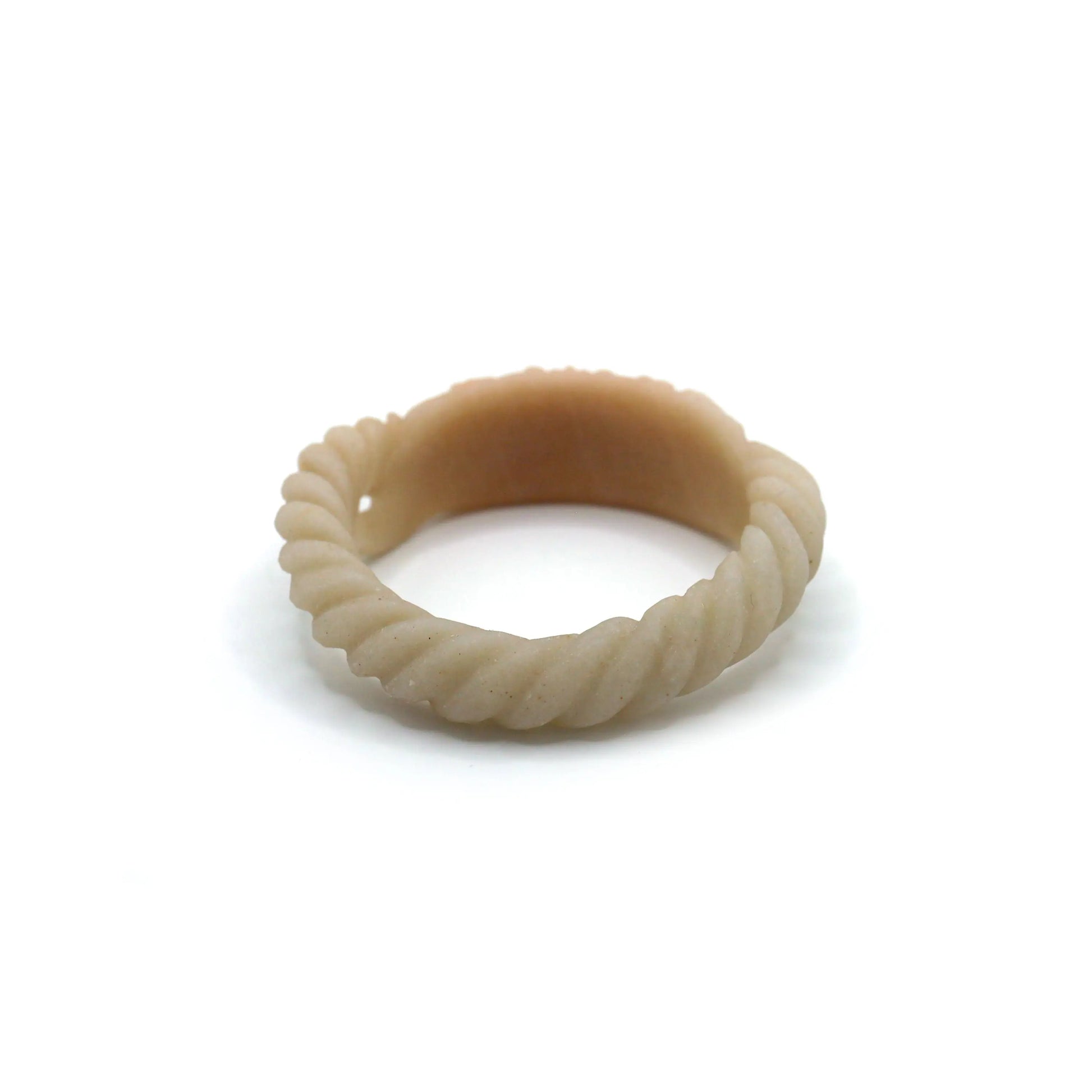 Unique jade bangle formed with a twisted arc transitioning into an ornate peony plaque, combining form and symbolism in natural stone – Miruzi