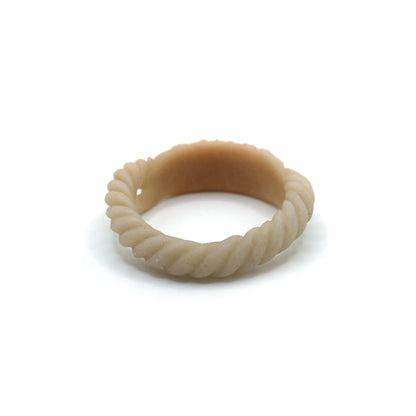 Unique jade bangle formed with a twisted arc transitioning into an ornate peony plaque, combining form and symbolism in natural stone – Miruzi