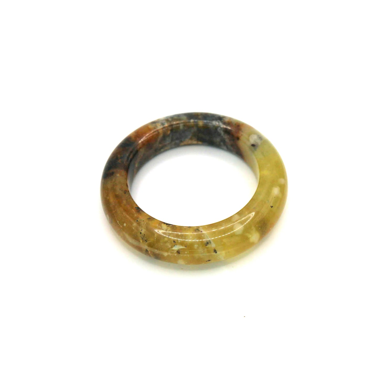 High-contrast yellow jade bangle with radiant translucence and matte mineral texture in one sculptural form

